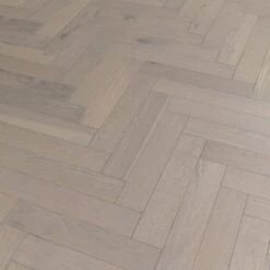 Liberty Floors Pebble Grey Oak - Herringbone Parquet 14mm Engineered Real Wood Flooring (219386) -Floor Shop pebble grey oak herringbone parquet 14mm engineered real wood flooring 219386 p85834 201395 image